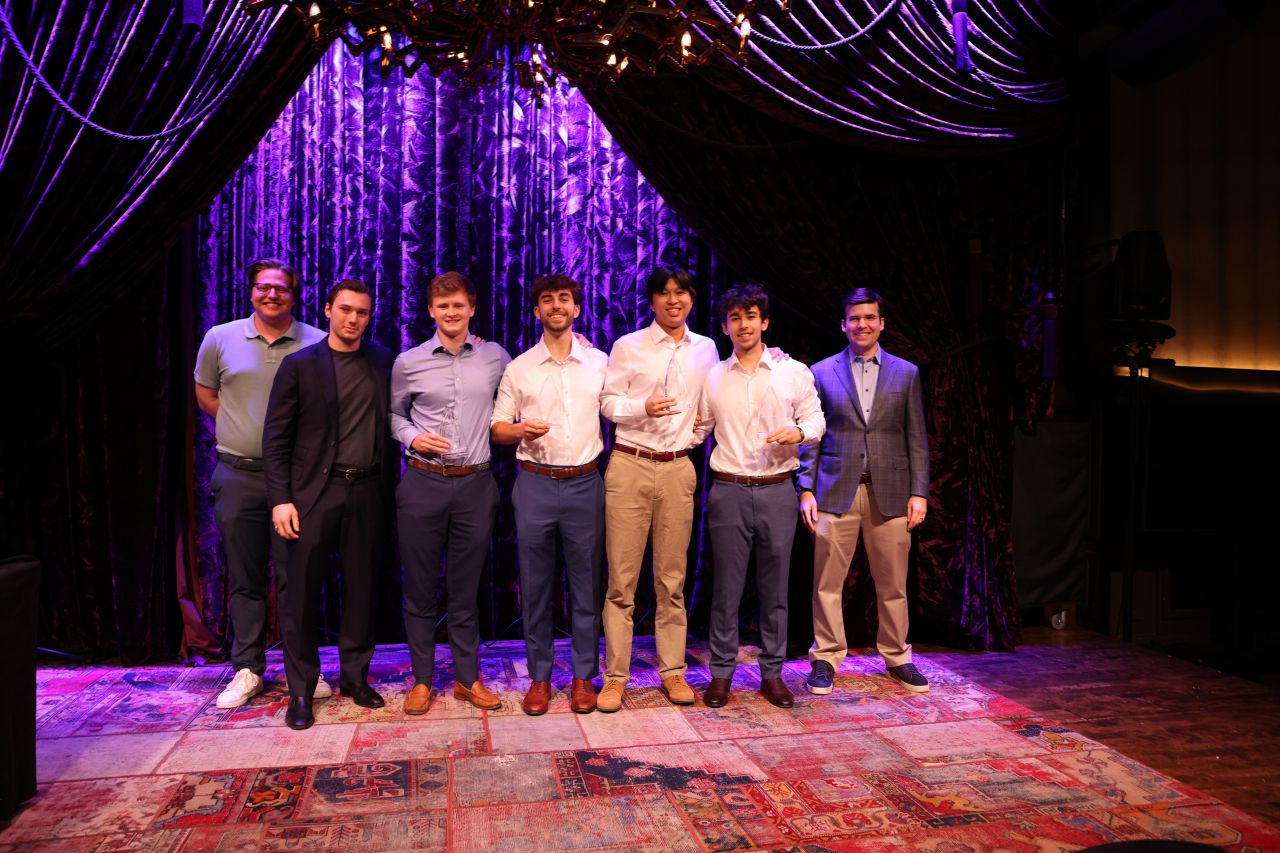 The winning team on stage at the Dry Dock Venture Studio Hackathon